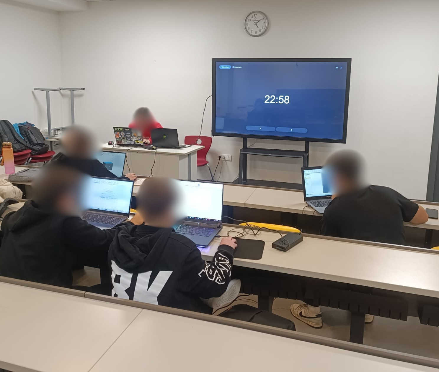 Emre teaching a class of engineering students